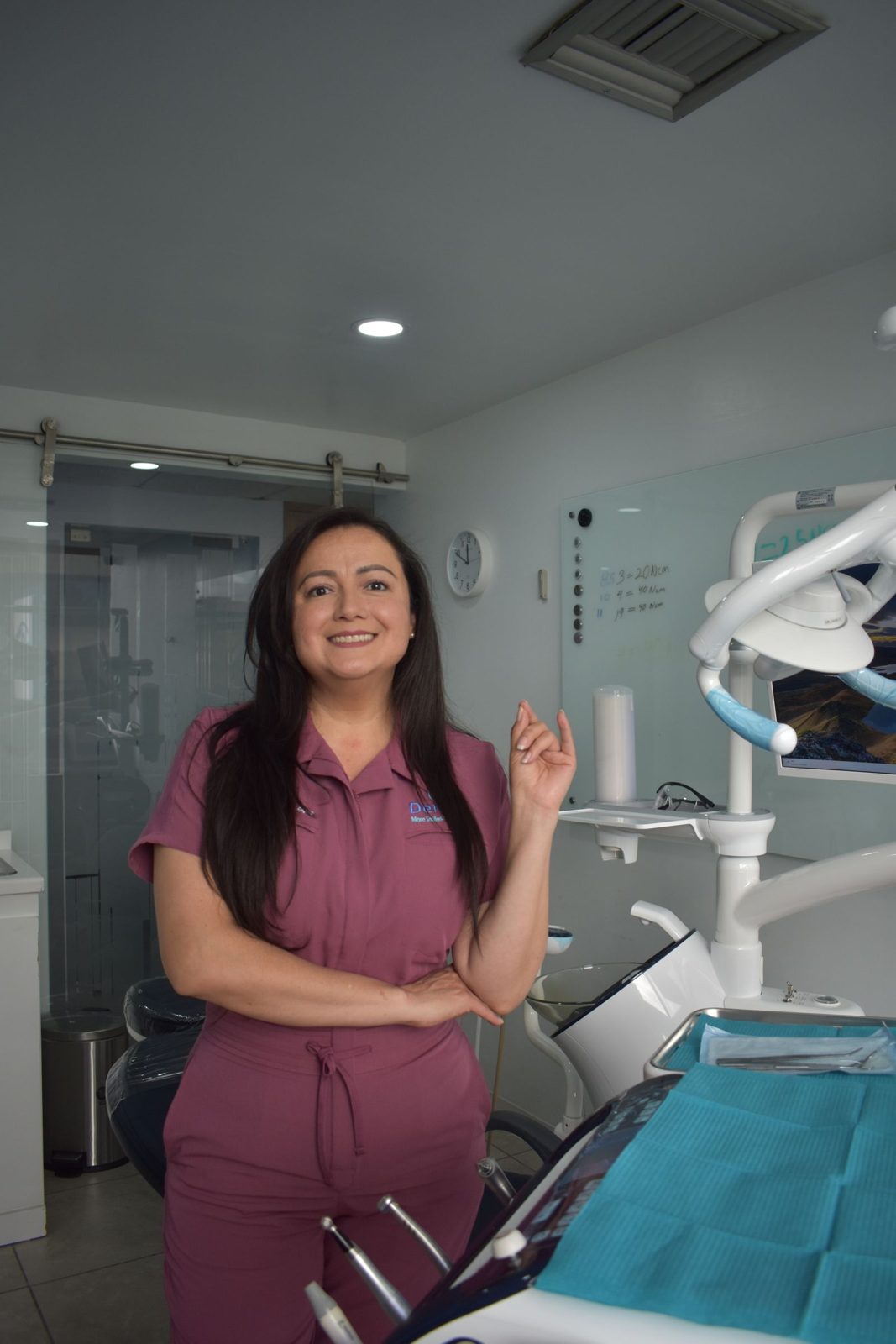 Dental clinician in a modern treatment room